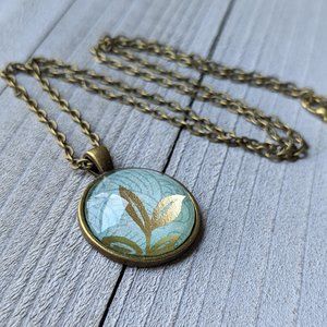 Glass Dome Cabochon Necklace with Gold Leaves & Pale Green Lines Pattern